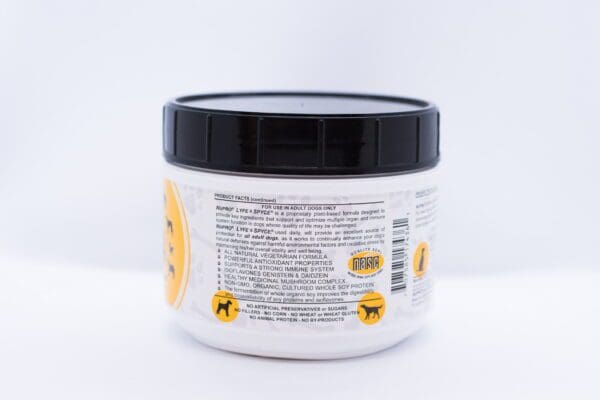 A jar with a lid on a white background, containing Nupro Lyfe Spyce for dogs.
