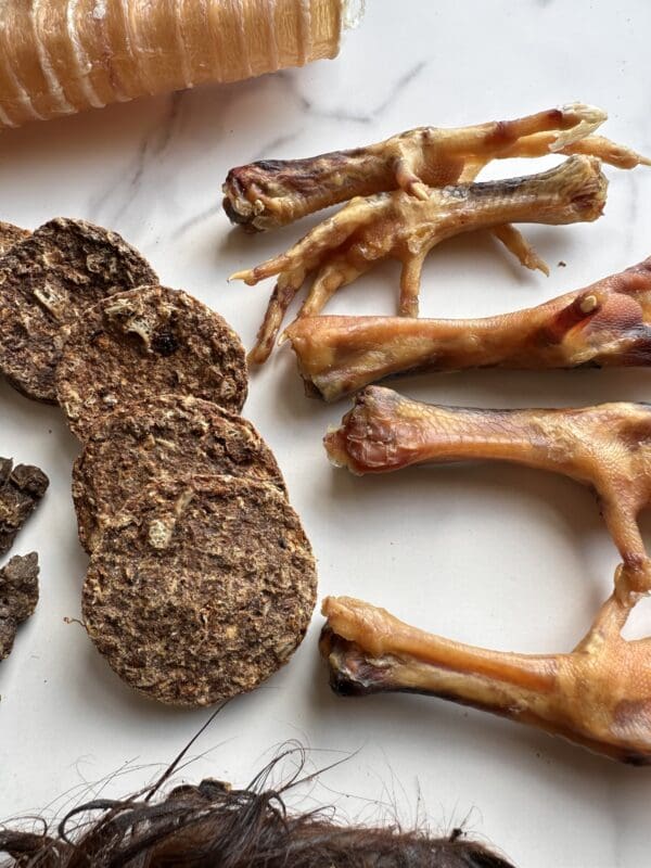 A close up of some meat and bones on the table